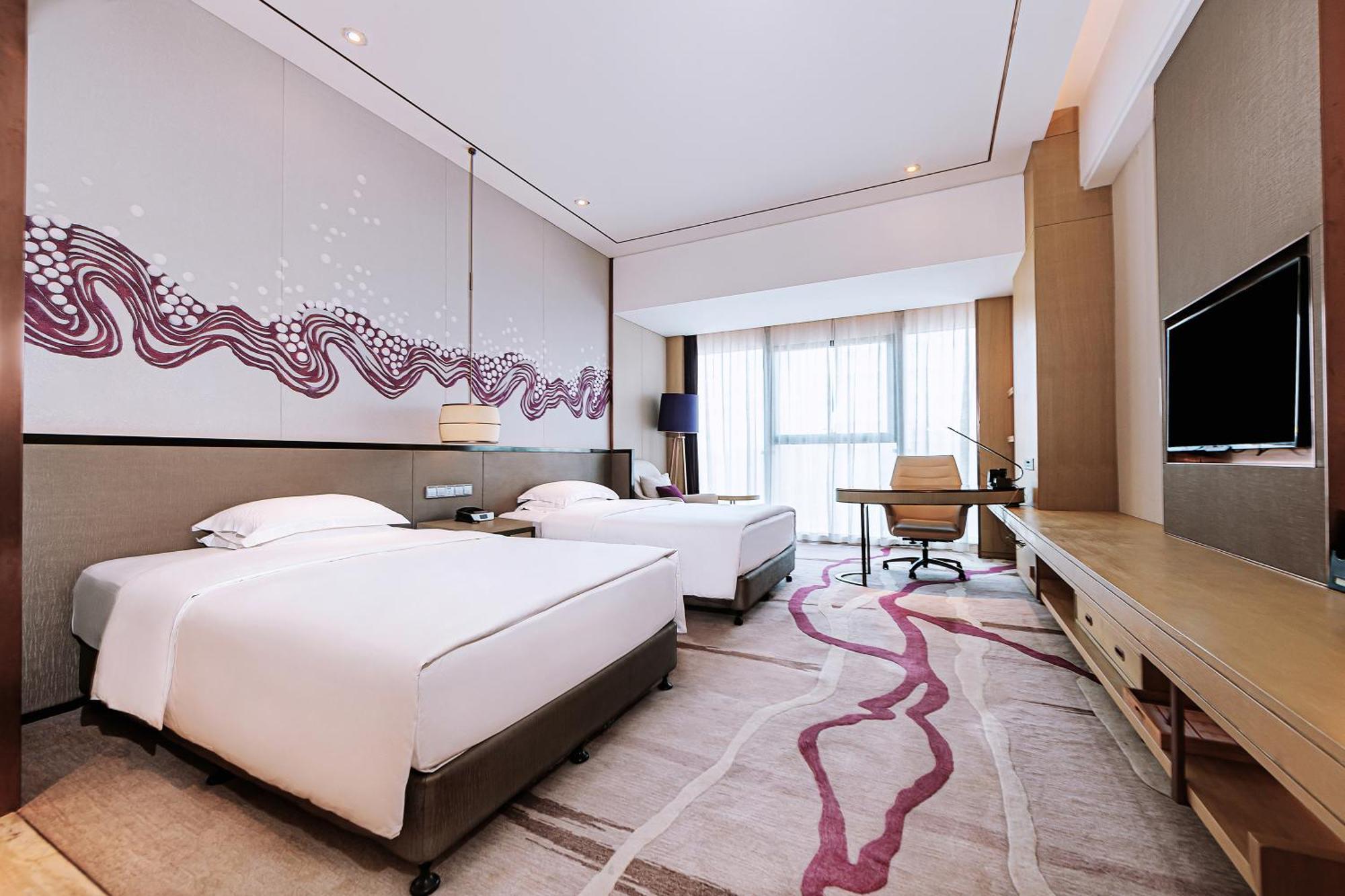 คราวน์ พลาซา อี้ปิน Hotel อี๋ปิน ภายนอก รูปภาพ